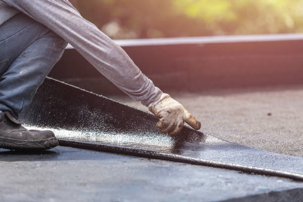 Professional Basement Waterproofing technician working in Roachdale, IN